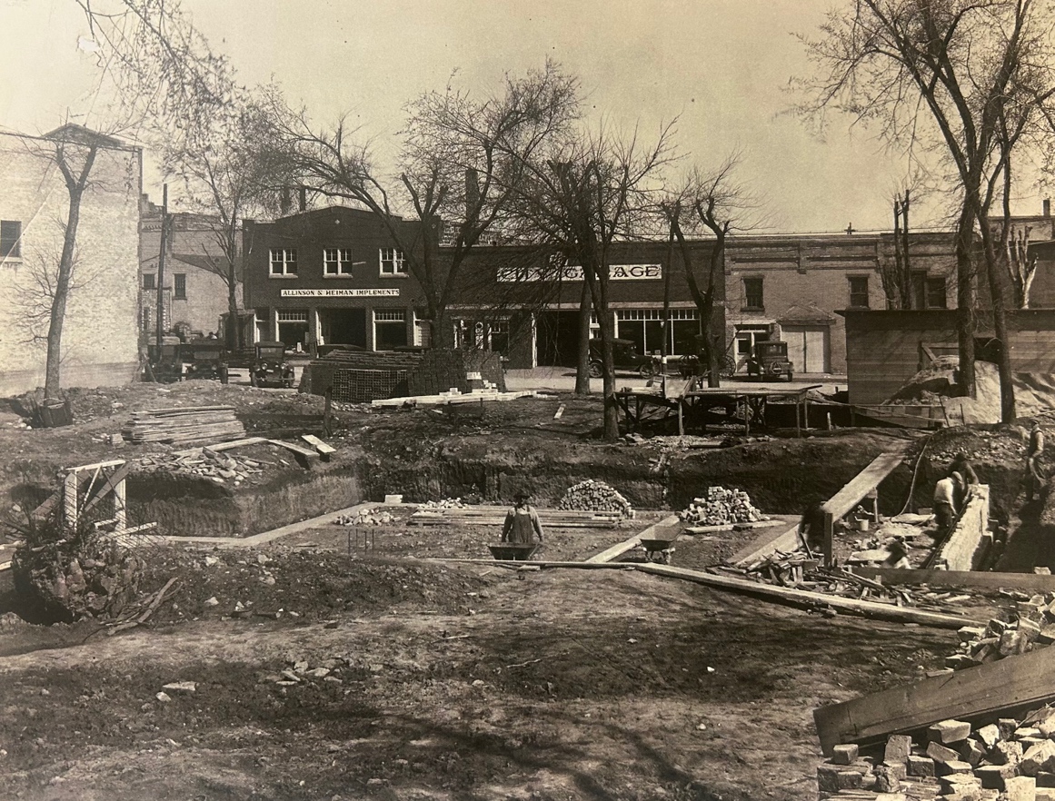 1924 photo of Allinson and Heiman Implements during Post Office construction